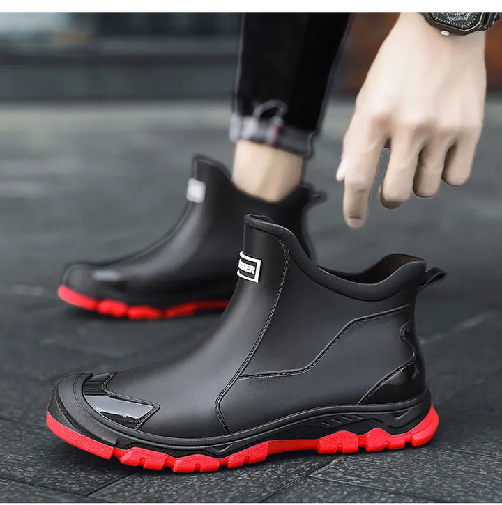 Terrain ankle boots with round toes, pull tabs and lugged soles