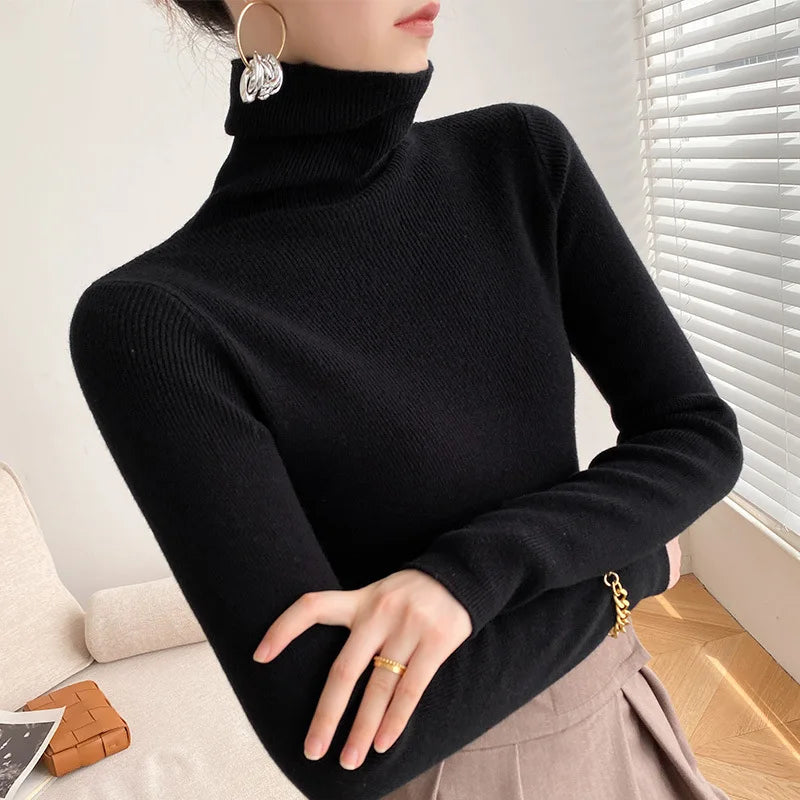 Women's ribbed turtleneck sweater with long sleeves and a slim fit