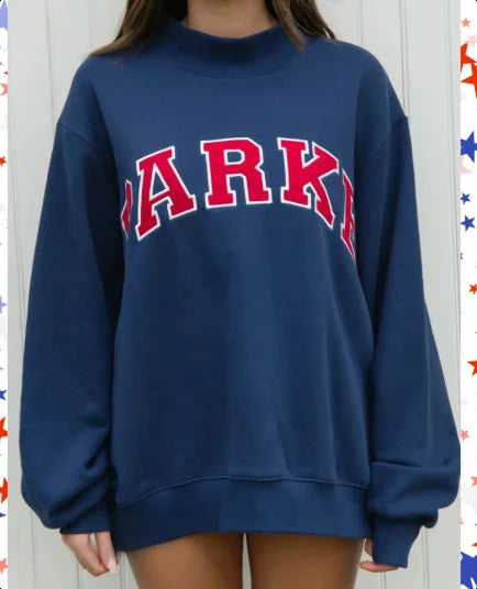 Women's pink oversized crewneck sweatshirt with letter graphic