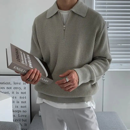 Men's quarter zip rib knit sweater with collared neckline and long sleeves