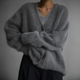 Women's loose fuzzy V-neck cardigan with button front