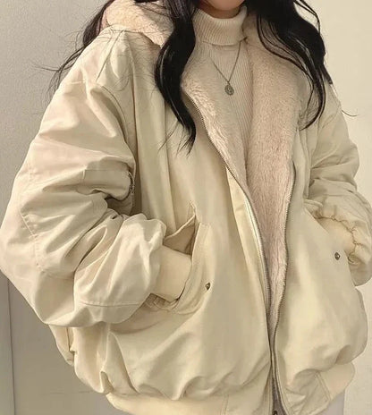 Women's lined bomber-style winter jacket with plush collar and zip front