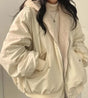 Women's lined bomber-style winter jacket with plush collar and zip front