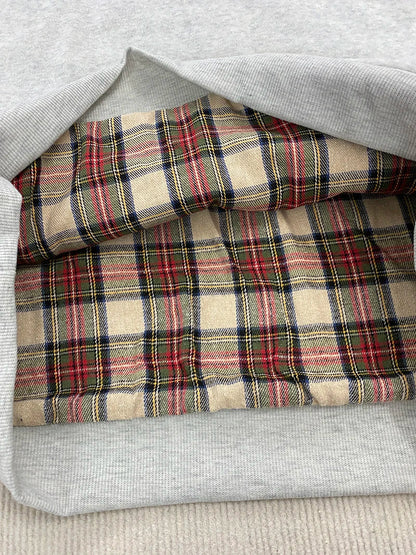 Loose hooded sweatshirt with plaid lining and kangaroo pocket