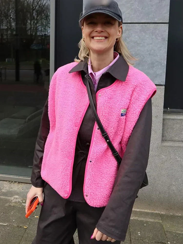 Women's textured sherpa vest with snap buttons and contrast edging