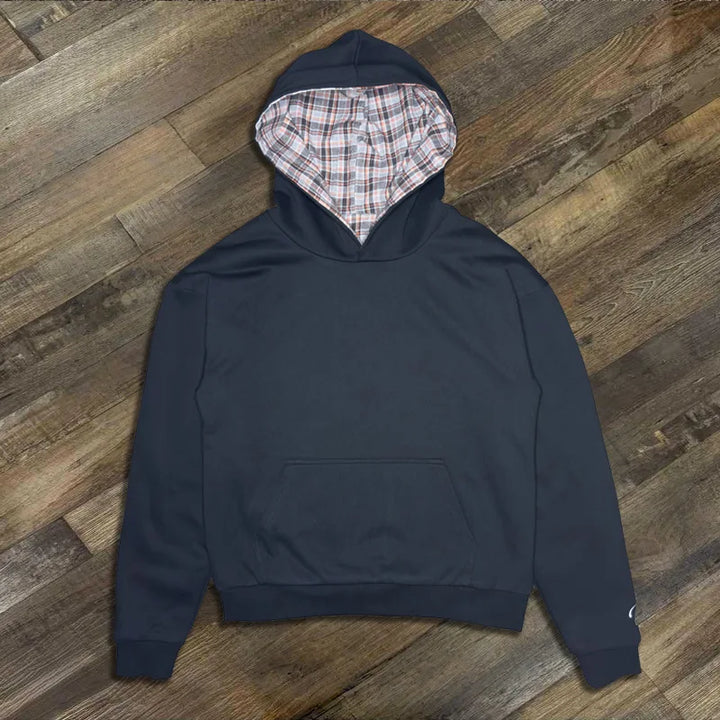 Loose hooded sweatshirt with plaid lining and kangaroo pocket
