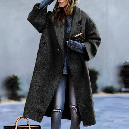 Women's long lapel coat with single button and front pockets