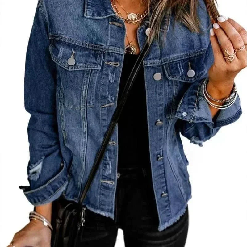 Women's distressed denim jacket with button front, chest pockets and long sleeves
