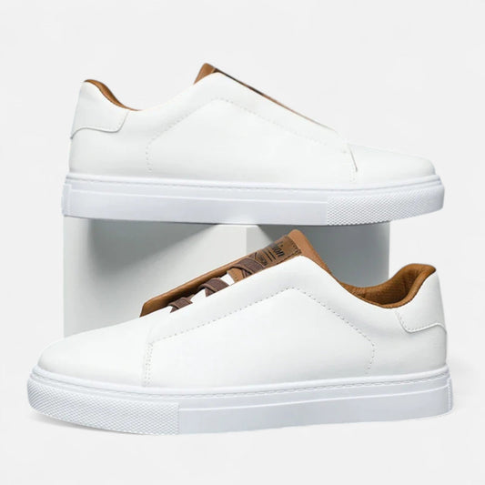 Men's low-top slip-on sneakers with stitched panels and flat white soles