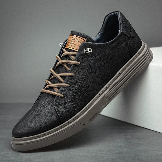 Men's low-top lace-up sneakers with stitched panels and a layered flat sole
