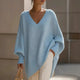 Women's oversized V-neck sweater with long sleeves and ribbed trim