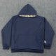 Loose hooded sweatshirt with plaid lining and kangaroo pocket