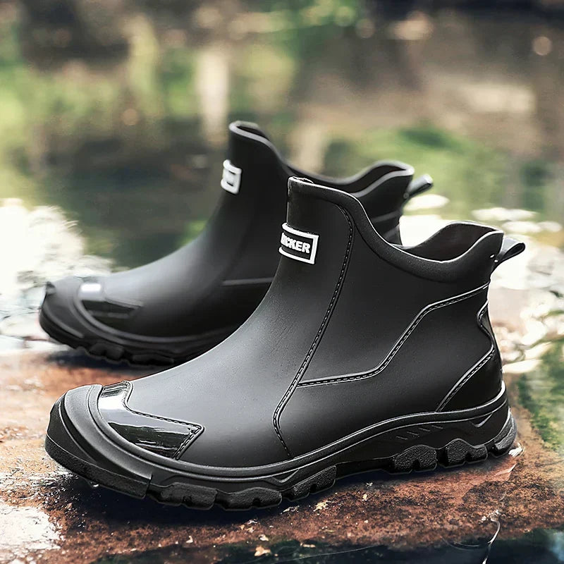 Terrain ankle boots with round toes, pull tabs and lugged soles