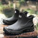 Terrain ankle boots with round toes, pull tabs and lugged soles