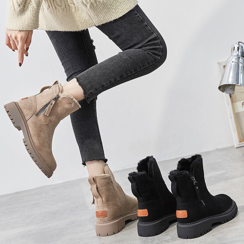 Women's ankle boots with fur-trimmed openings and chunky lug soles