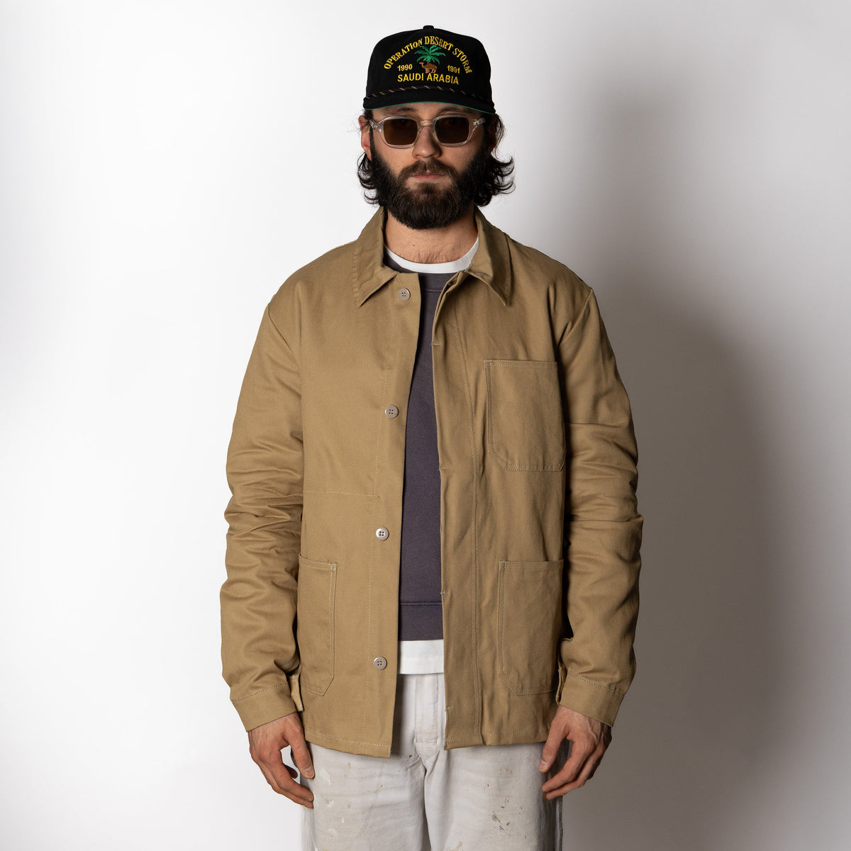 Men's brown utility jacket with point collar, button front and patch pockets