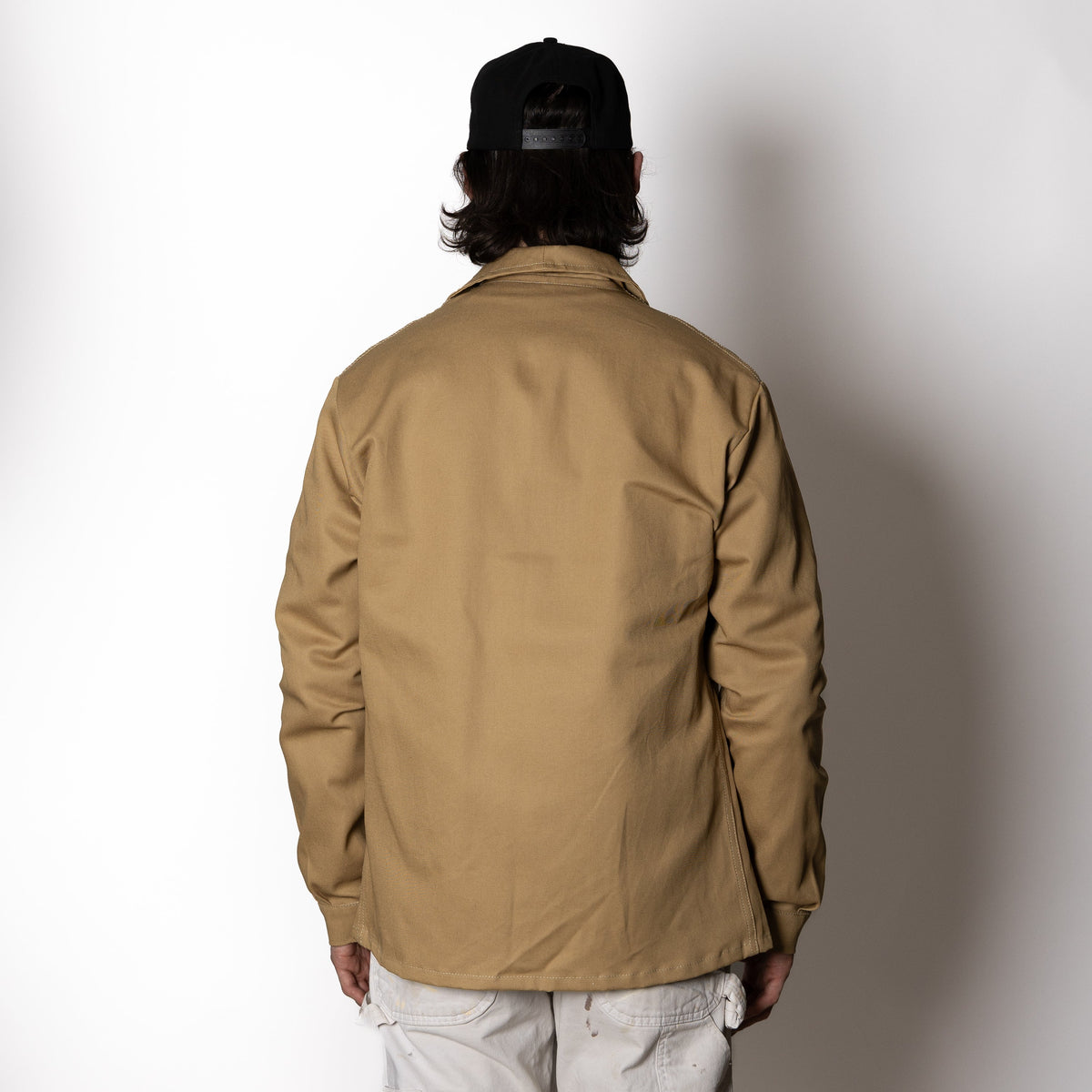 Men's brown utility jacket with point collar, button front and patch pockets
