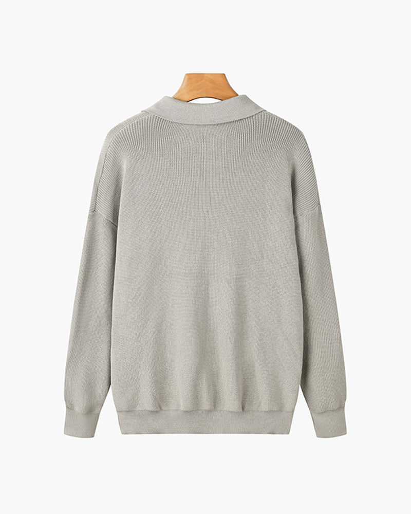 Men's ribbed quarter-zip sweater with pointed collar and long sleeves