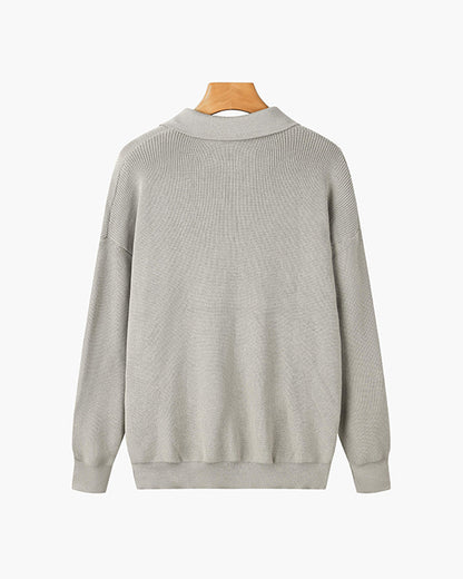 Men's ribbed quarter-zip sweater with pointed collar and long sleeves