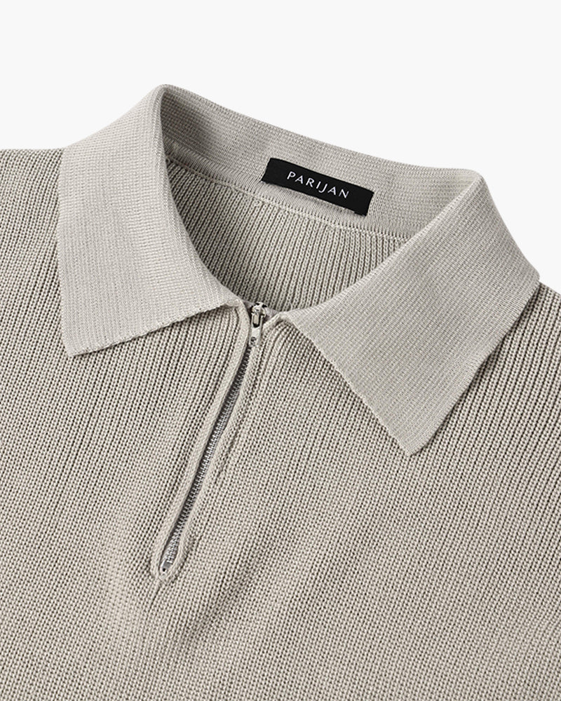 Men's ribbed quarter-zip sweater with pointed collar and long sleeves