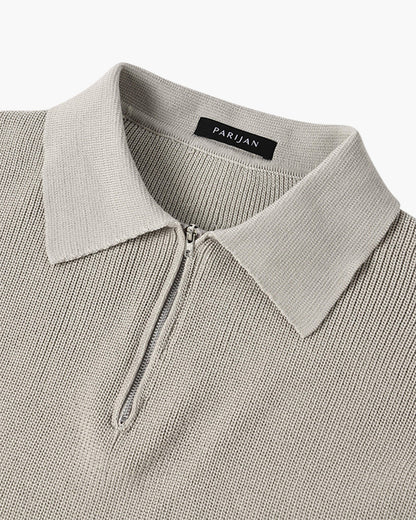 Men's ribbed quarter-zip sweater with pointed collar and long sleeves