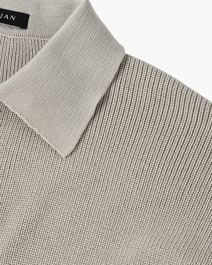 Men's ribbed quarter-zip sweater with pointed collar and long sleeves