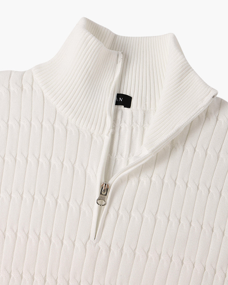 Half zip ribbed sweater in cream and black with crew neckline and long sleeves
