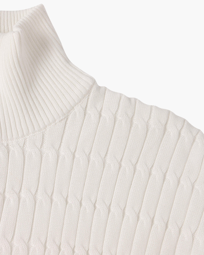 Half zip ribbed sweater in cream and black with crew neckline and long sleeves