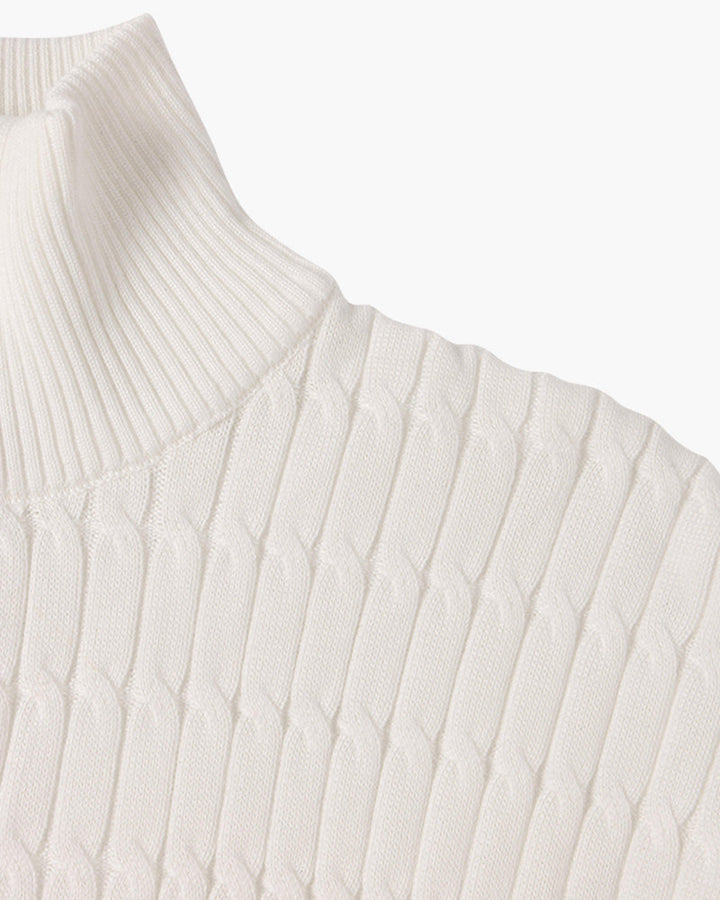 Half zip ribbed sweater in cream and black with crew neckline and long sleeves