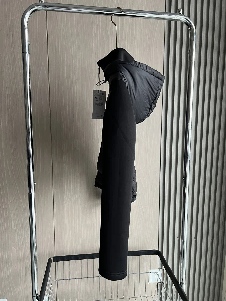 Women's black cropped hooded puffer jacket with long sleeves and front zip