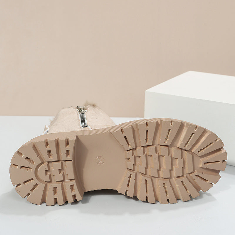 Women's ankle boots with fur-trimmed openings and chunky lug soles