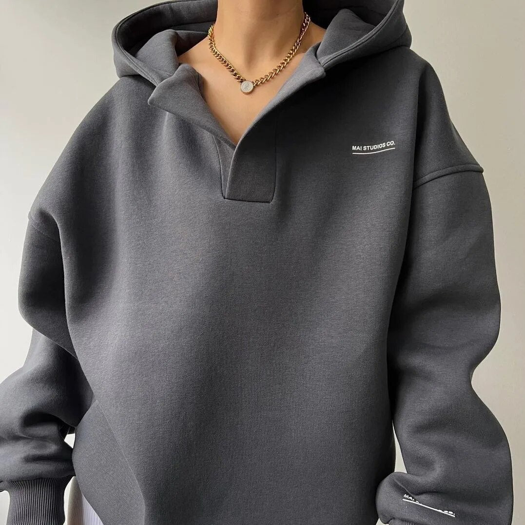 Women's hooded sweatshirt with long sleeves and ribbed trims