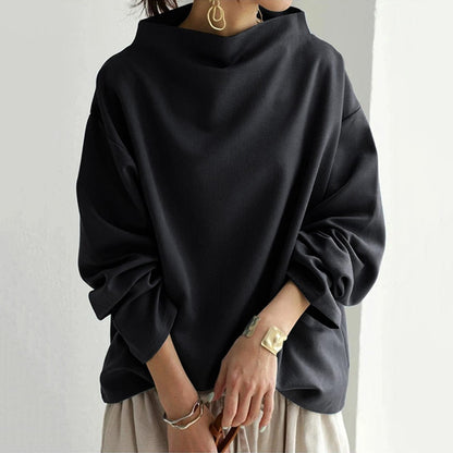 Women's relaxed high-neck top with long sleeves and wide cuffs