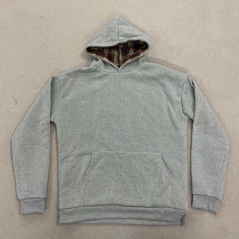 Loose hooded sweatshirt with plaid lining and kangaroo pocket