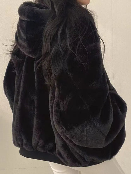 Women's lined bomber-style winter jacket with plush collar and zip front