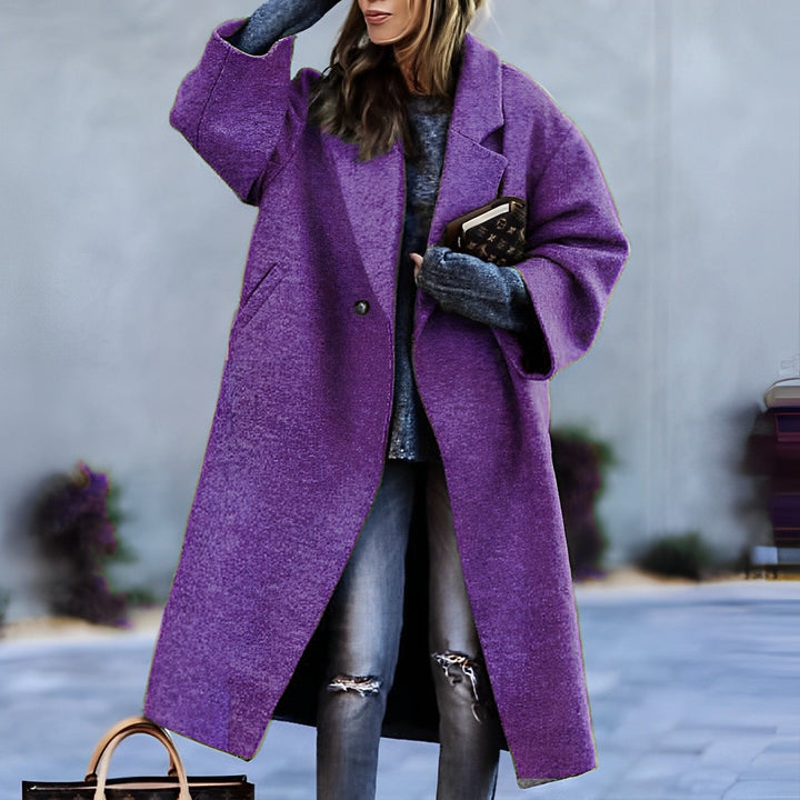 Women's long lapel coat with single button and front pockets