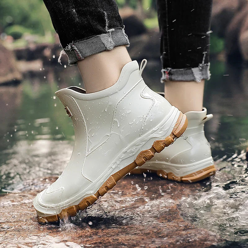 Terrain ankle boots with round toes, pull tabs and lugged soles