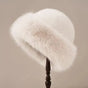Women's winter hat with a rounded brim and fuzzy finish