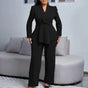 Woman wearing a beige peplum blazer suit set with wide-leg trousers