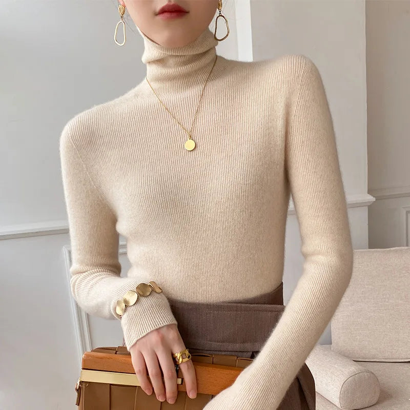 Women's ribbed turtleneck sweater with long sleeves and a slim fit