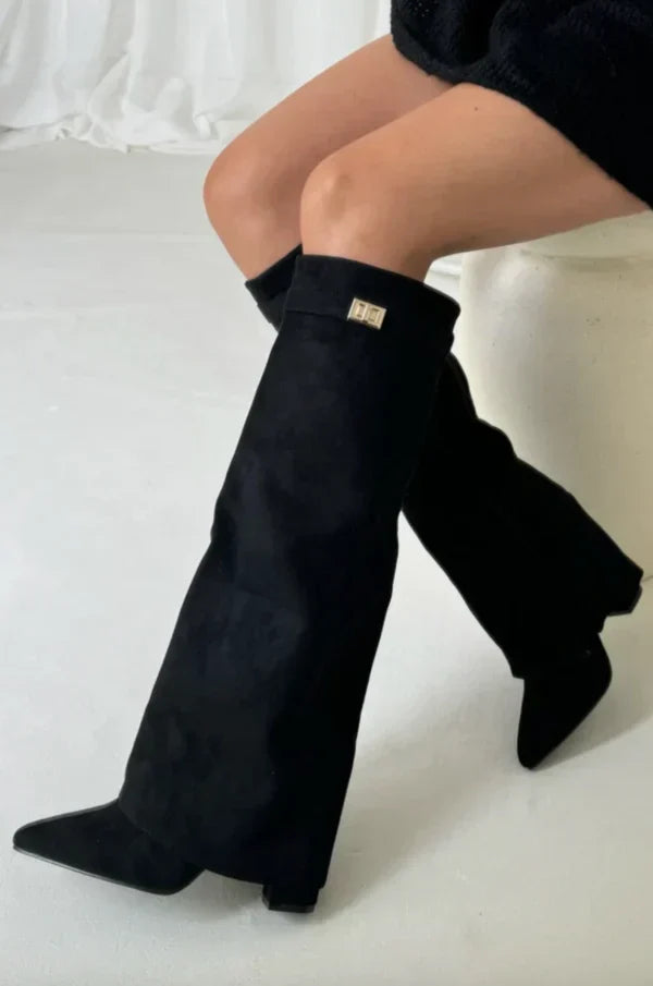 Women's knee-high pointed toe boots with high heel and buckle detail
