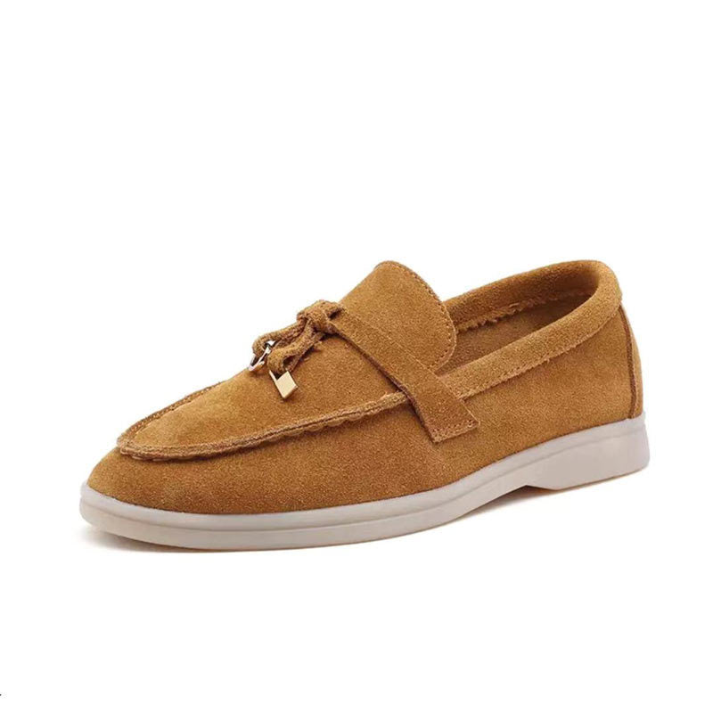 Women's flat slip-on loafers with rounded moc toe and metal trim