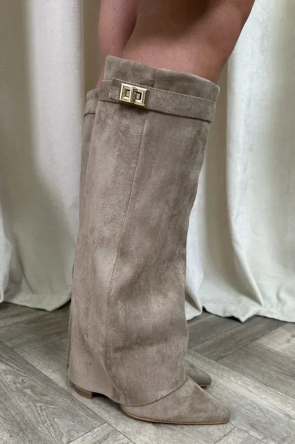 Women's knee-high pointed toe boots with high heel and buckle detail