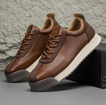 Low-top lace-up sneakers with textured side panels and layered flat soles