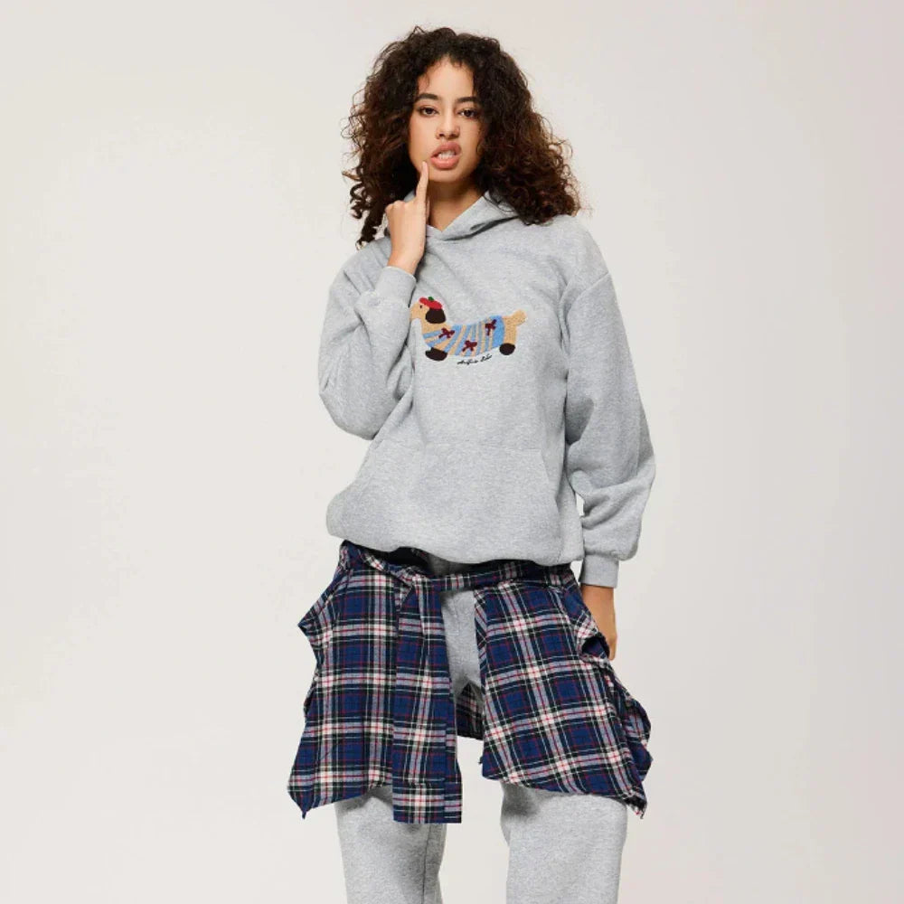 Women's hooded sweatshirt with dog graphic and kangaroo pocket