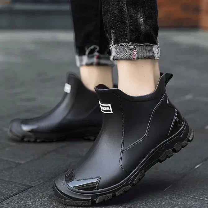 Terrain ankle boots with round toes, pull tabs and lugged soles
