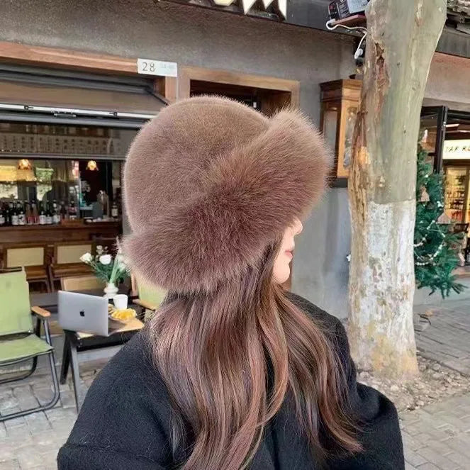 Women's winter hat with a rounded brim and fuzzy finish
