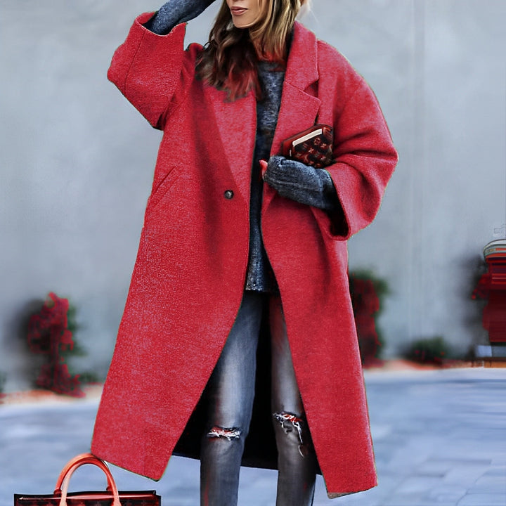 Women's long lapel coat with single button and front pockets