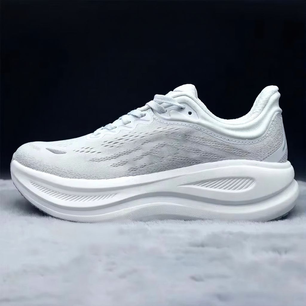 Low-top lace-up running sneaker with thick cushioned sole