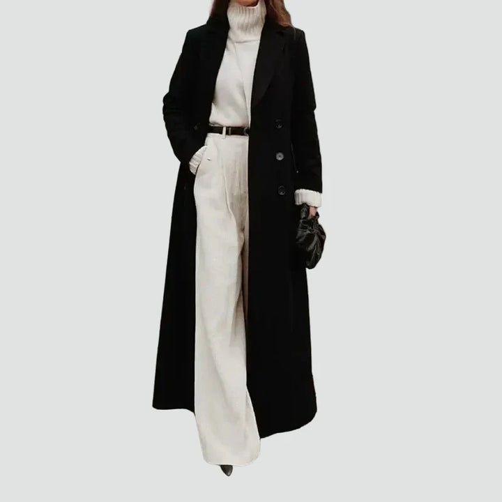 Women's black long double-breasted coat with notched lapels and long sleeves